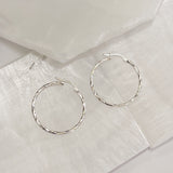 TWISTED SILVER HOOP earring