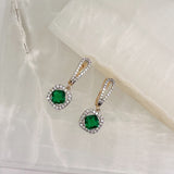 CRYSTAL EMERALD DANGLE earrings